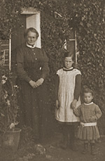 Old family group photo (woman with two granddaughters)
