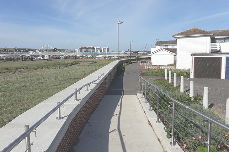 Shoreham Adur Tidal Walls Flood Defence Scheme - between houseboats and footbridge