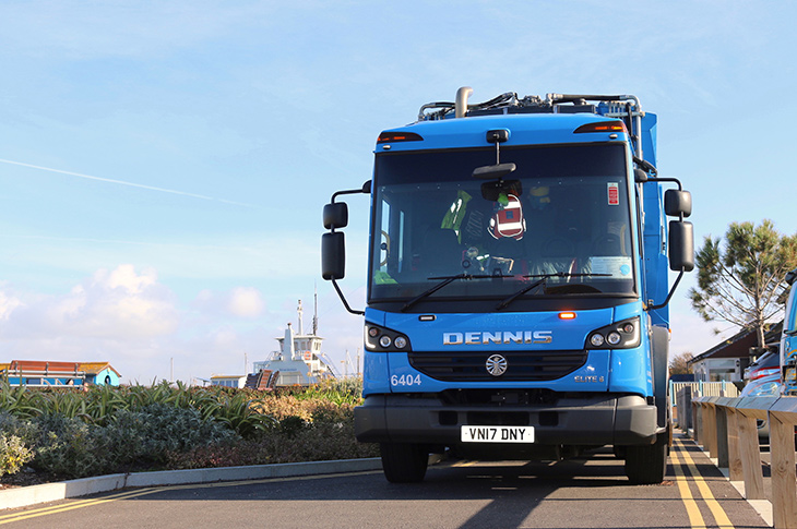 Recycling lorry out on a collection round (waste truck in Shoreham)