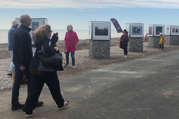 Pop up photo fringe - members of the public looking at the exhibition