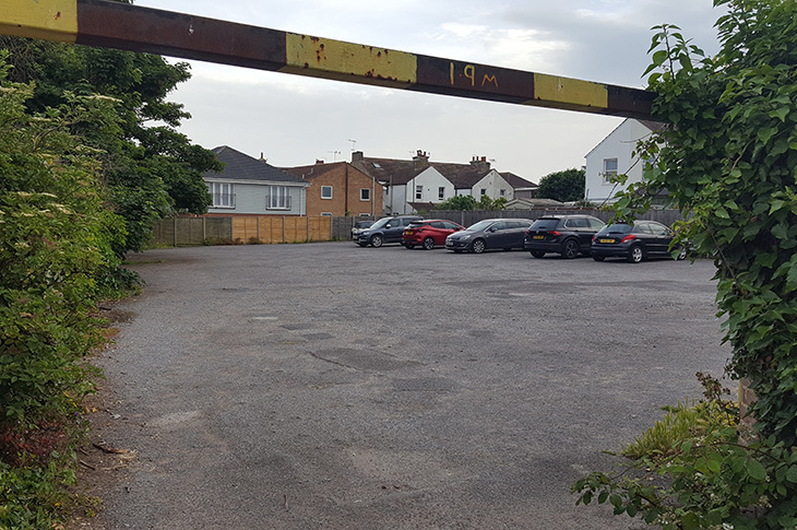 2022 June - South Street car park in Lancing (height barrier and parked cars)