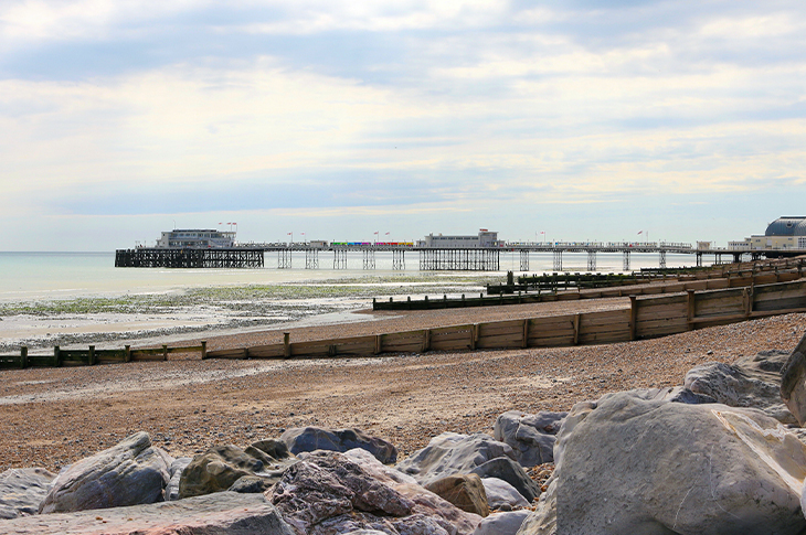 Worthing Beach and the pier at low tide