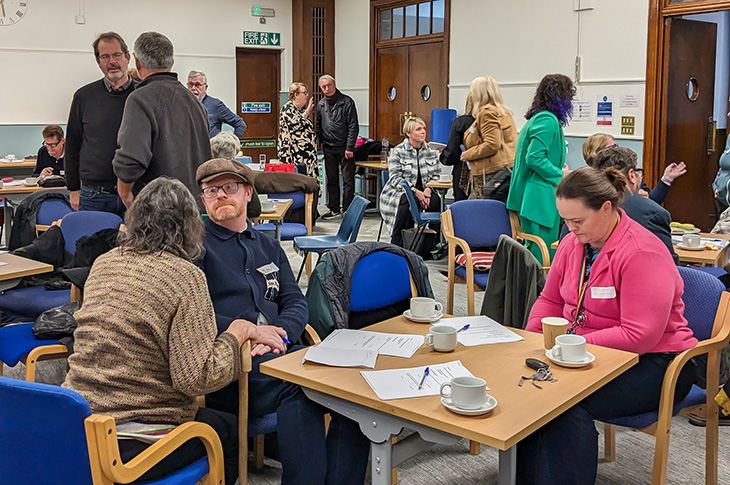 PR23-165 - Community groups networking at the event held at Worthing Town Hall