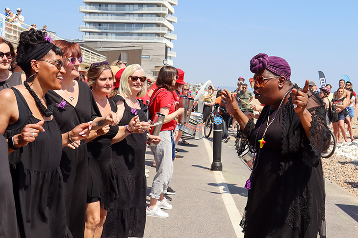 PR23-179 - Worthing Festival - Drumheads and the Spring into Soul Choir brought their samba show to the town on the prom
