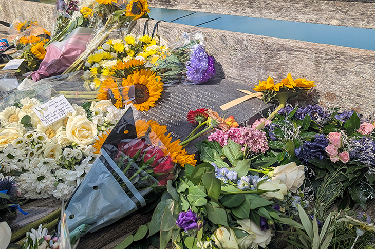 Shoreham Airshow 10th anniversary memorial service - flowers and cards on the Old Shoreham Toll Bridge
