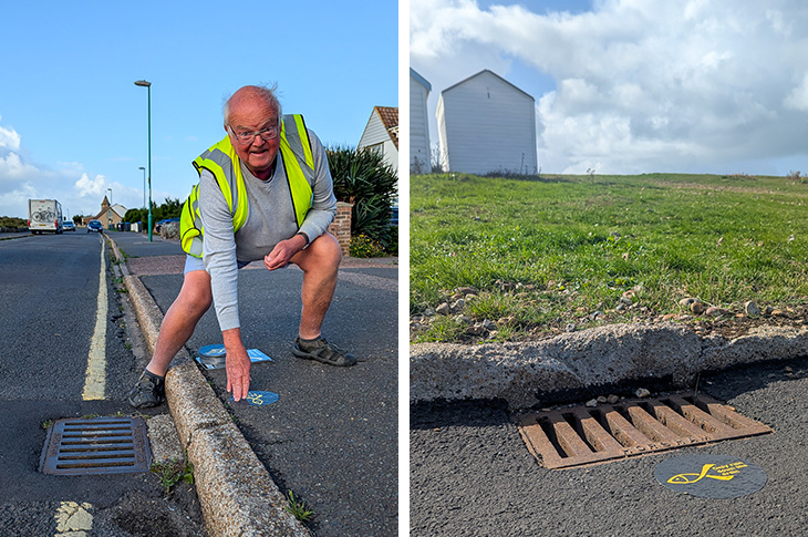 Cllr Andy Harvey placing one of the yellow fish stickers by a drain