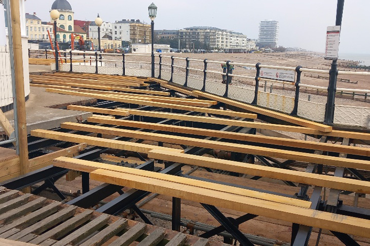 Worthing Pier - the decking joists being replaced