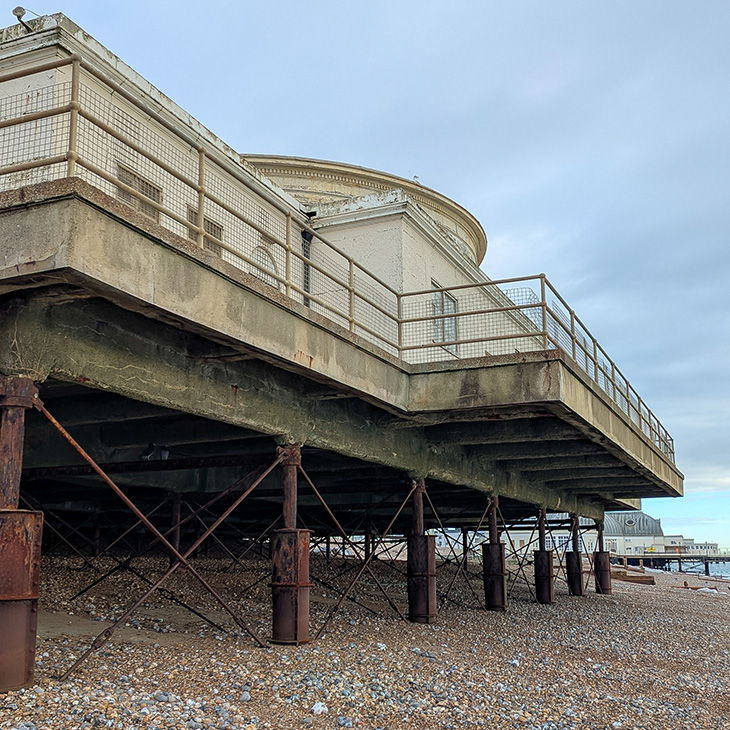 Worthing Lido - looking under the Lido, viewed from the beach (January 2026).jpg