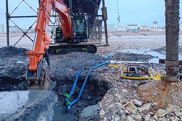 Worthing Pier - excavating and removing the concrete foundations of the broken pile