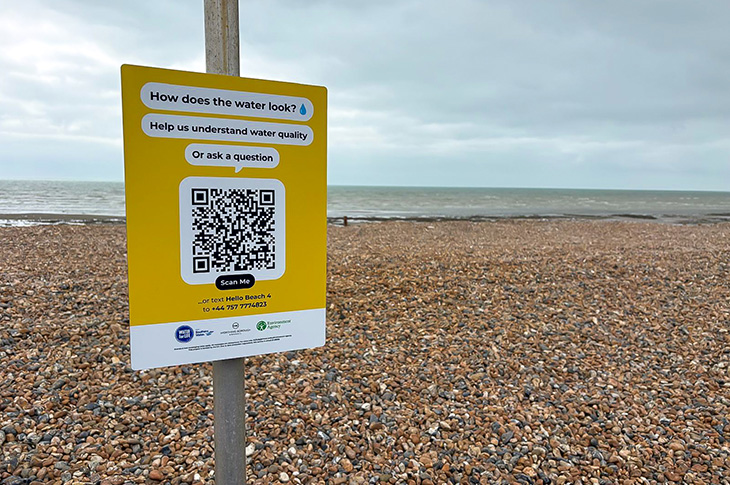 PR26-035 - One of the Hello Lamp Post signs on Worthing promenade