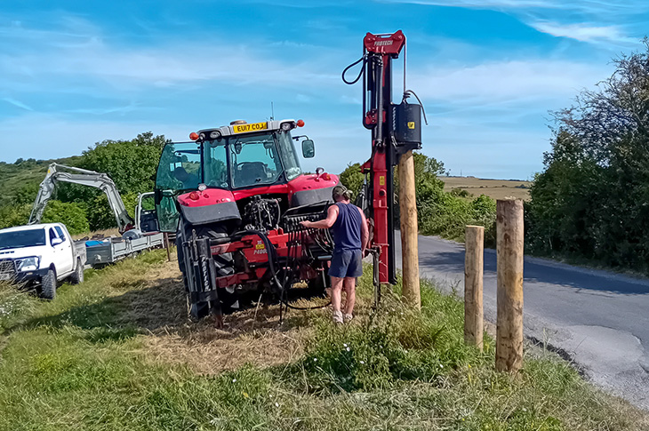 Exmoor ponies at Mill Hill in Shoreham - installing the new fenceposts