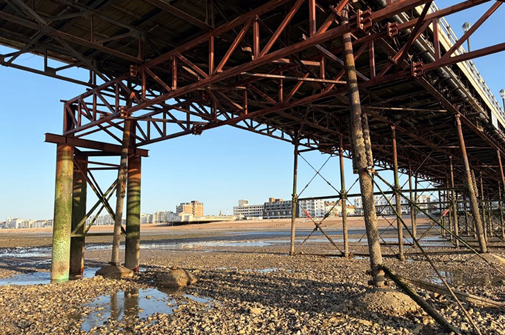 Worthing Pier - the supports and piles under the pier (from the beach under the pier) - May 2026