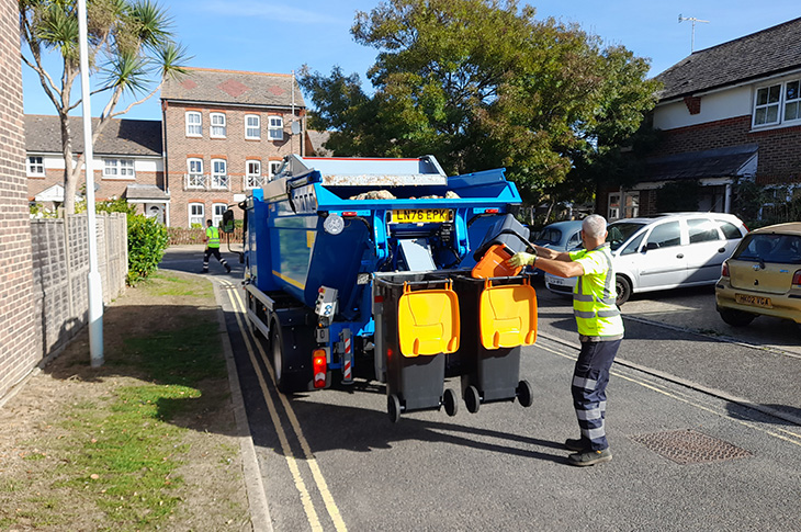 Food waste being collected and loaded into a food waste truck (1)