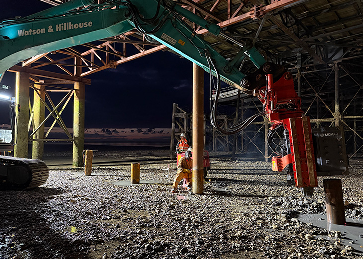 Worthing Pier - driving the four 12m-long piles into the beach (3)